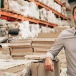 Smiling man in warehouse